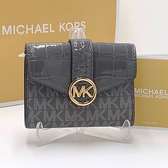 Michael Kors Handbags - MICHAEL KORS CARMEN MEDIUM FLAP LOGO
AND FAUX LEATHER WALLET
HEATHER GREY MULTI
